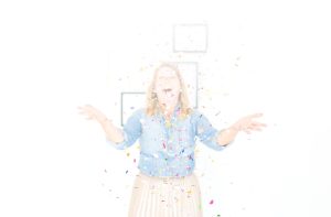 Woman throwing confetti